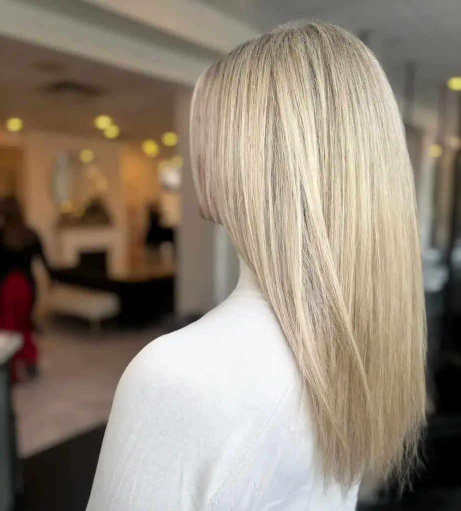 Sleek, straight platinum blonde lengths